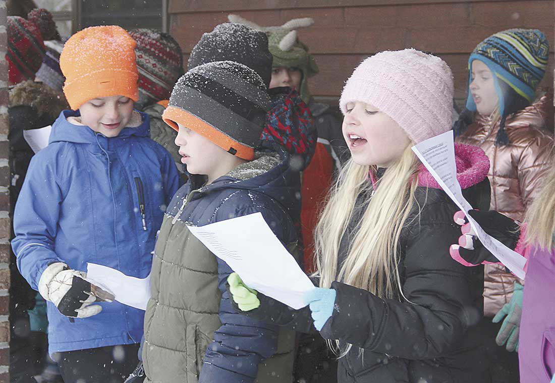Little carolers bring cheer to Osceola
